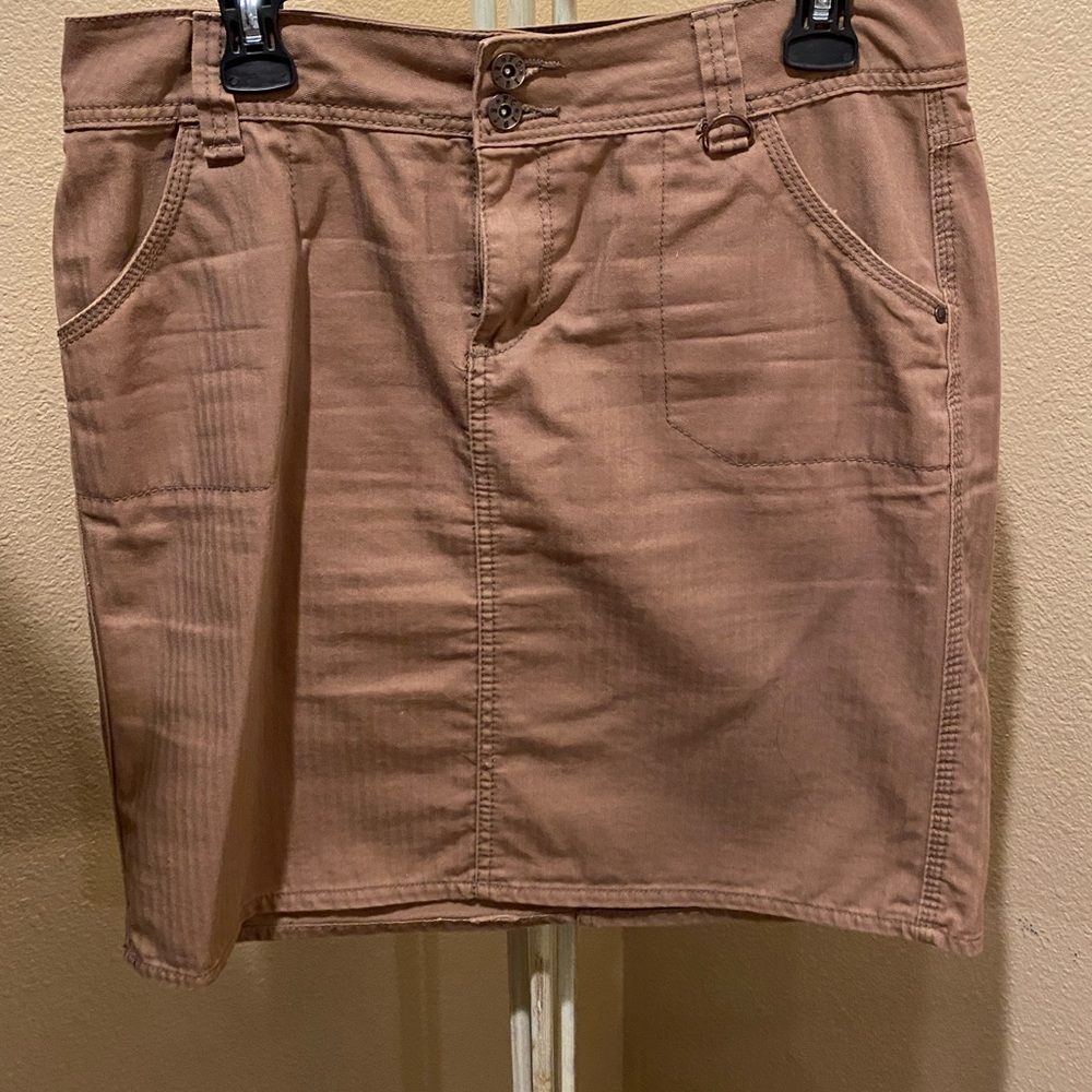 Taupe mini skirt.